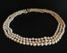 Collier Collier 3 rangs de perles de culture avec fermoir en or jaune 18 carats 58 Facettes