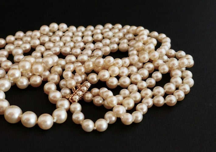 Collier Collier 3 rangs de perles de culture avec fermoir en or jaune 18 carats 58 Facettes