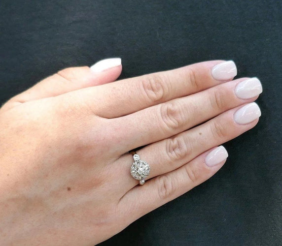 Bague 53 Bague marguerite ancienne en or jaune 18 carats, platine et diamants 58 Facettes