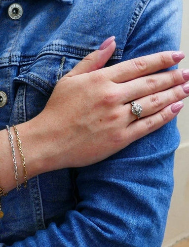 Bague 53 Bague marguerite ancienne en or jaune 18 carats, platine et diamants 58 Facettes