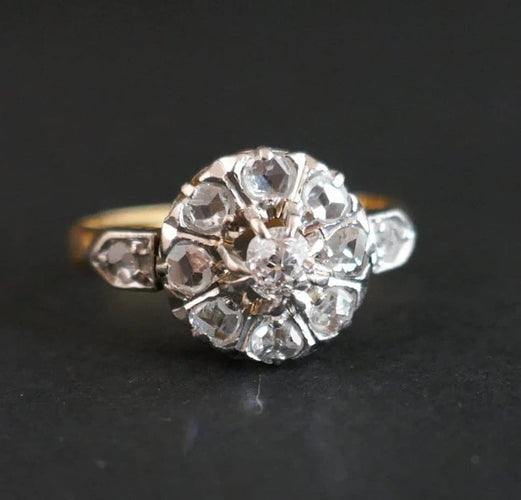 Bague 53 Bague marguerite ancienne en or jaune 18 carats, platine et diamants 58 Facettes