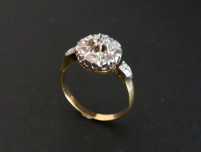 Bague 53 Bague marguerite ancienne en or jaune 18 carats, platine et diamants 58 Facettes