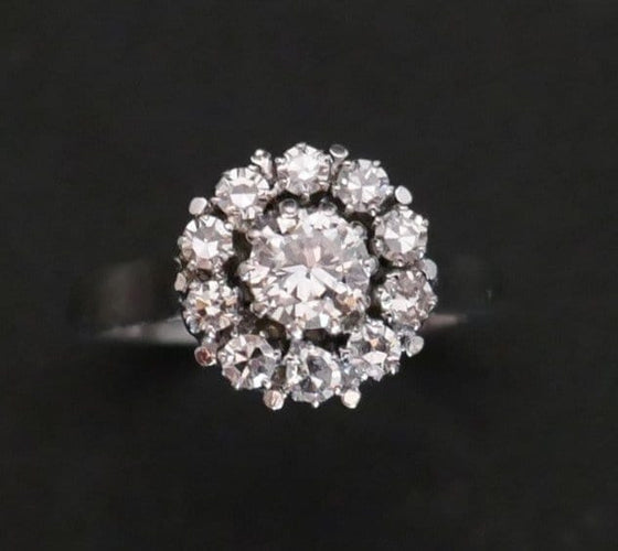 Bague 53 Bague marguerite - Diamants en or blanc 18 carats 58 Facettes