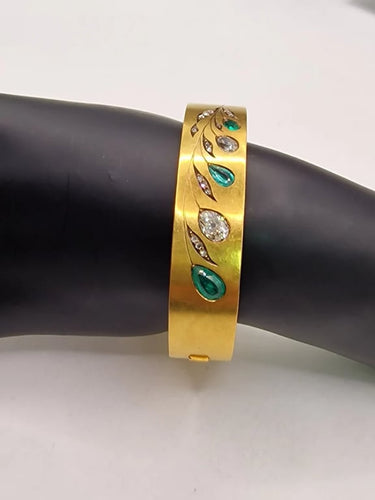Bracelet Bracelet vintage années 1970 en or jaune 20 carats, diamants et émeraudes 58 Facettes