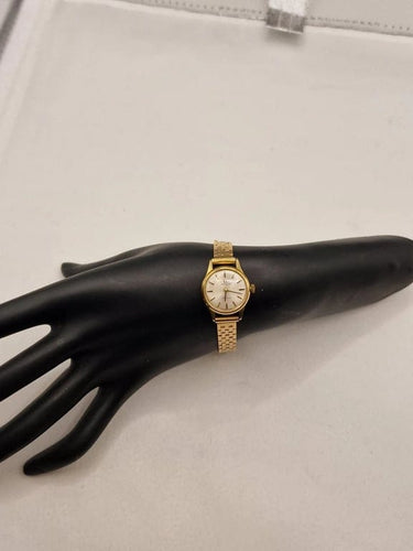 Montre Omega Genève - Montre vintage en or jaune 18 carats 58 Facettes