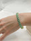 Bracelet Bracelet vintage en or blanc et jaune 18 carats, émail vert et diamants 58 Facettes