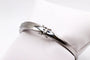 Bracelet Bracelet jonc ouvrant en or blanc 750 serti de diamants 58 Facettes 250141