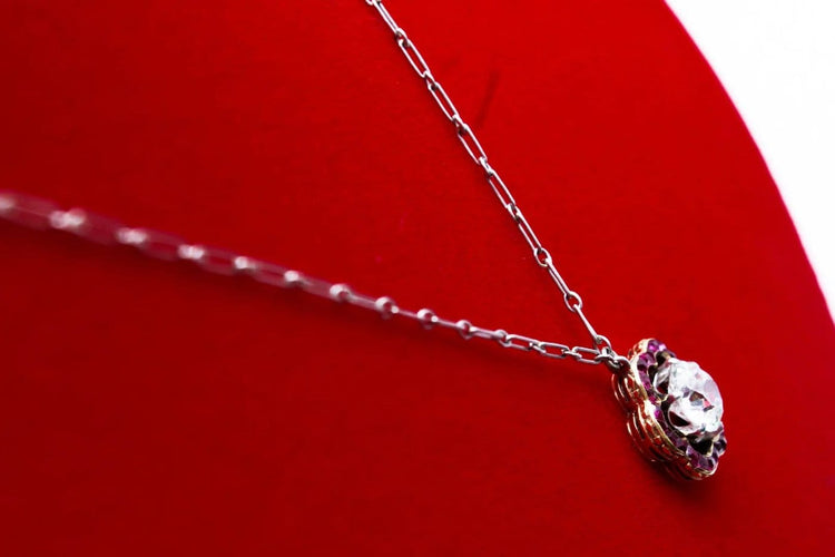 Collier Collier marguerite en or jaune, platine, diamant et rubis 58 Facettes 240285