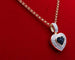 Pendentif Pendentif cœur en or bicolore 750/000, saphirs et diamants 58 Facettes 250253