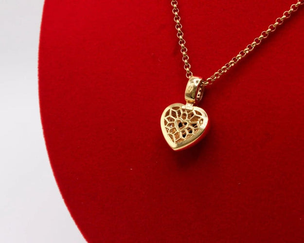 Pendentif Pendentif cœur en or bicolore 750/000, saphirs et diamants 58 Facettes 250253