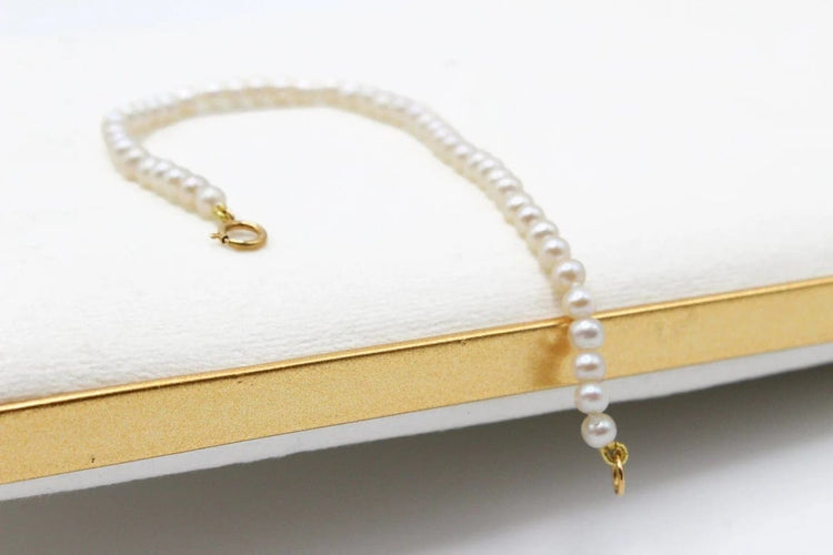Bracelet Bracelet perles d’eau douce avec fermoir en or jaune 750 58 Facettes 250129