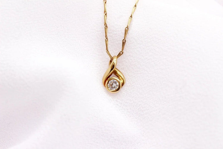 Pendentif Pendentif boucle en or jaune et diamant 58 Facettes 250437