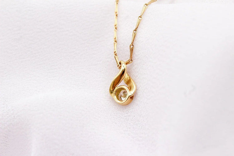 Pendentif Pendentif boucle en or jaune et diamant 58 Facettes 250437