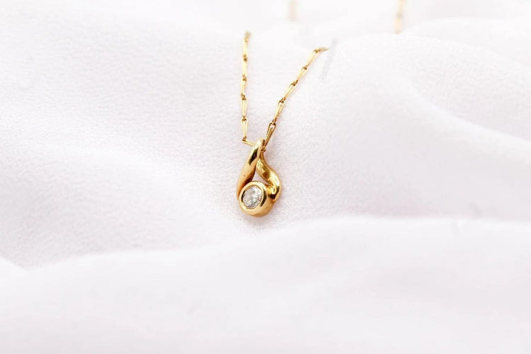 Pendentif Pendentif boucle en or jaune 18 carats et diamant 58 Facettes 250437