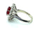 Bague 51 Bague entourage en or blanc 18 ct avec rubis birman et diamants 58 Facettes