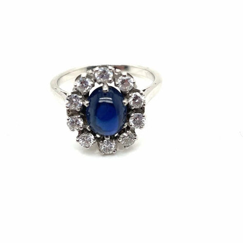 Bague 52 Bague marguerite ancienne en or blanc et platine, saphir cabochon et diamants 58 Facettes