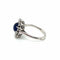 Bague 52 Bague marguerite ancienne en or blanc et platine, saphir cabochon et diamants 58 Facettes