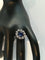 Bague 52 Bague marguerite ancienne en or blanc et platine, saphir cabochon et diamants 58 Facettes