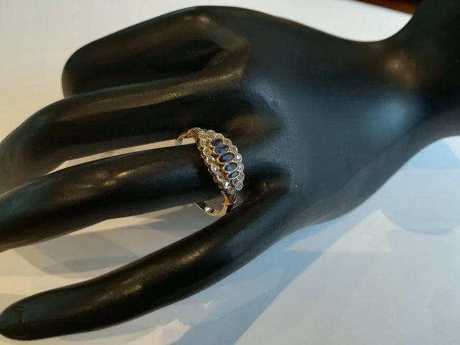Bague 56 Bague jarretière ancienne en or jaune et or blanc, saphirs et diamants 58 Facettes