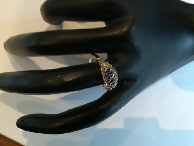 Bague 56 Bague jarretière ancienne en or jaune et or blanc, saphirs et diamants 58 Facettes
