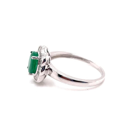 Bague 56 Bague marguerite en or blanc avec émeraude et diamants 58 Facettes