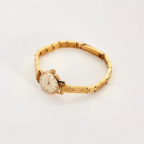 Montre Sygma-Valmon - Montre mécanique dame en or jaune 750 58 Facettes