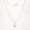 Collier Collier avec pendentif en or blanc 18 carats et diamant 0,15 ct 58 Facettes