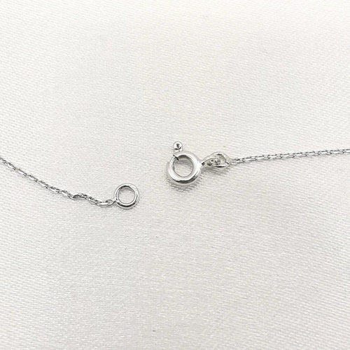 Collier Collier avec pendentif en or blanc 18 carats et diamant 0,15 ct 58 Facettes
