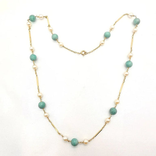Collier Collier en or jaune 18 carats et perles de culture 58 Facettes
