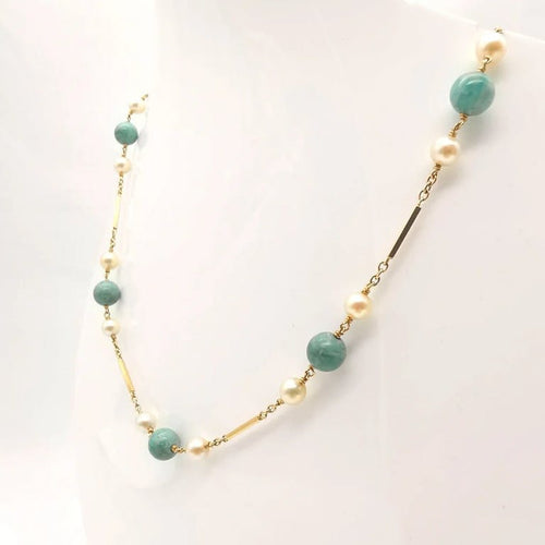 Collier Collier en or jaune 18 carats et perles de culture 58 Facettes