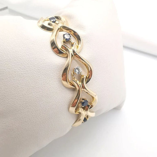 Bracelet Bracelet en or jaune 18 carats avec diamants et saphirs 58 Facettes