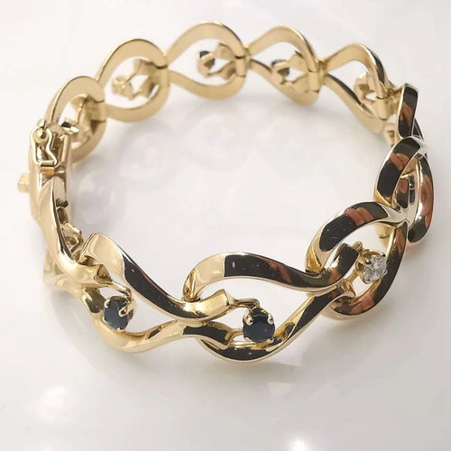 Bracelet Bracelet en or jaune 18 carats avec diamants et saphirs 58 Facettes