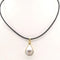 Collier Collier en or jaune 18 carats avec cordon en cuir et perle 58 Facettes