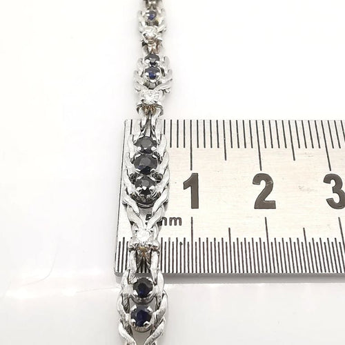 Bracelet Bracelet ancien en or blanc 18 carats, saphirs et diamants 58 Facettes