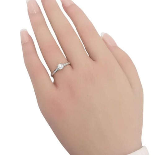 Bague 54 Bague solitaire en or gris 18 carats et diamants 58 Facettes