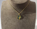 Pendentif Cartier - Pendentif Sagittaire en or jaune et émail plique-à-jour 58 Facettes