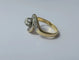 Bague 50 Bague Tourbillon en or jaune 18 carats et platine sertie de diamants 58 Facettes