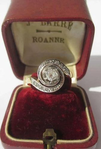 Bague 50 Bague Tourbillon en or jaune 18 carats et platine sertie de diamants 58 Facettes