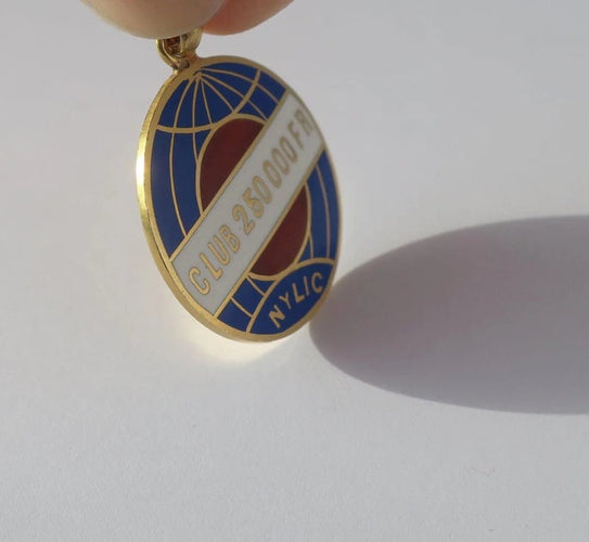 Pendentif New York Life Insurance Company - Pendentif globe terrestre ancien en or jaune émaillé 58 Facettes
