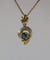 Pendentif Pendentif cœur bicolore en or 18 carats et saphir 58 Facettes