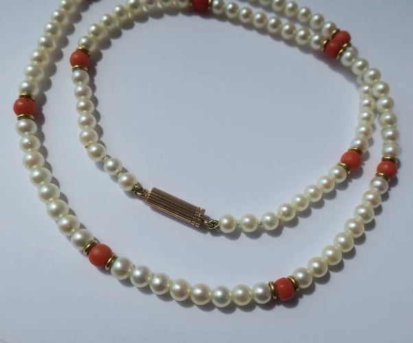 Collier choker or rose perles de culture Akoya corail