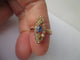 Bague 55 Bague marquise en or rose, saphir synthétique et perles 58 Facettes