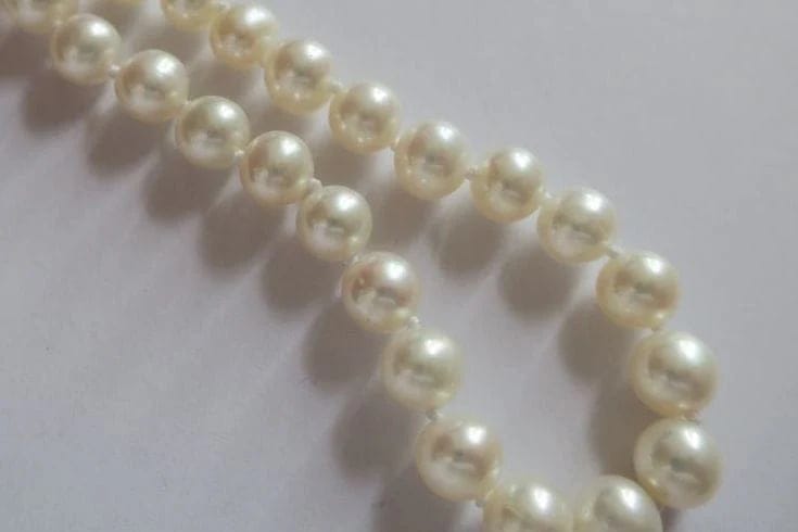 Bracelet Bracelet en or jaune et perles de culture 58 Facettes