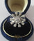 Bague 51 Bague marguerite fleur en or blanc 18 carats et platine avec diamants 58 Facettes