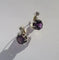 Boucles d'oreilles Boucles d’oreilles dormeuses anciennes en or jaune 18 carats et améthystes 58 Facettes