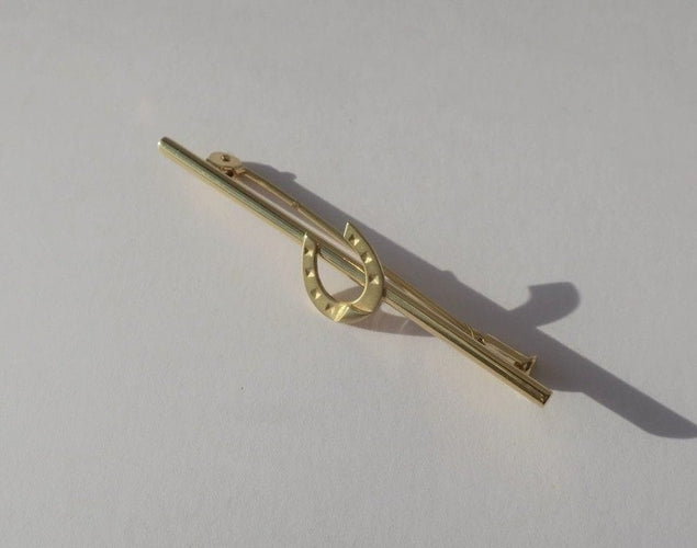 Broche Broche barrette fer à cheval en or jaune 18 carats 58 Facettes