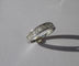 Bague 50.5 Bague alliance demi-tour en or blanc 18 carats et diamants 58 Facettes