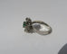Bague 54 Bague Pompadour en or blanc, émeraude et diamants 58 Facettes