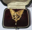 Pendentif Broche-pendentif chimère 1900 en or jaune et perles 58 Facettes
