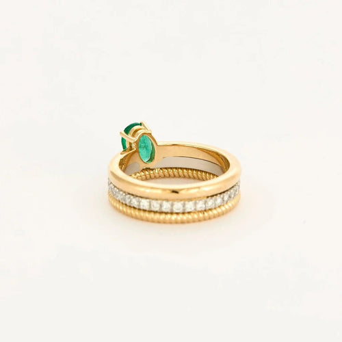 Bague 50 Bague multi-anneaux torsadés en or jaune, platine, diamants et émeraude 58 Facettes